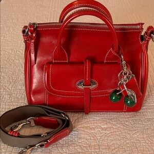 Dooney and Bourke small red Toscana Florentine leather front pocket satchel